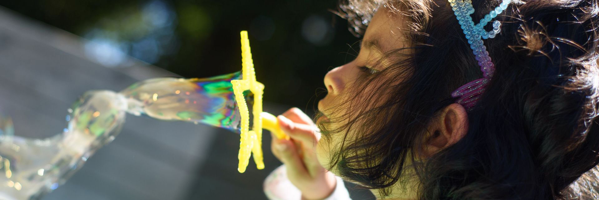 Girl blowing bubbles